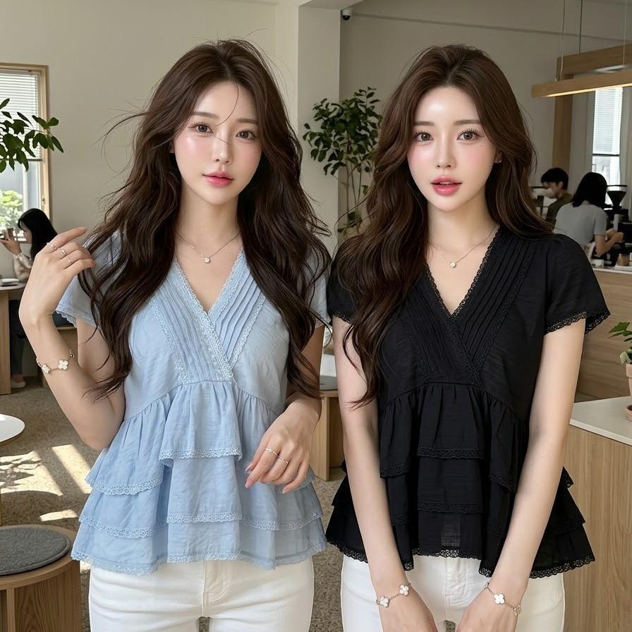 KN.Clothes เสื้อคอวีแขนสั้น เย็บตีเกล็ดไขว้ช่วงคอ แต่งระบายช่วงตัว 3 เลเยอร์ ผูกโบว์หลัง MM