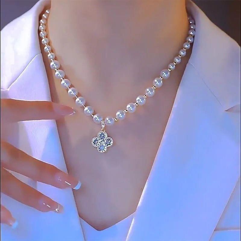 ใหม่หรูหรา Four-Leaf Pearl สร้อยคอภาษาฝรั่งเศสคํา All-Match High-End แฟชั่น All-Match Clavicle ประณี