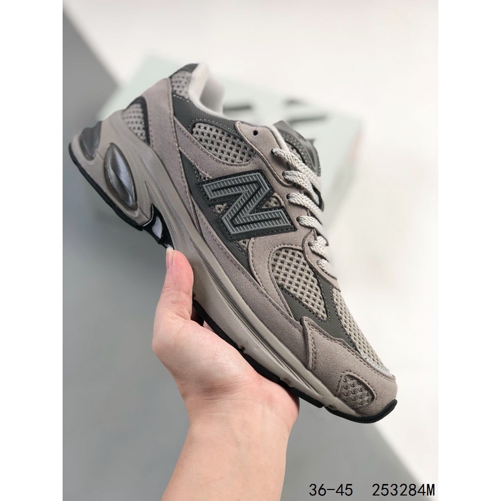 New Balance NB 2010 รองเท้ากีฬา unisex กลางแจ้ง ทําให้เก่าด้วยหนังกลับสีทึบและรองเท้าเพิ่มความสูง