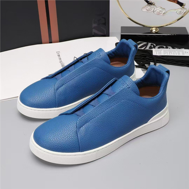 ZEGNA รองเท้าผ้าใบส้นเตี้ยหนังผู้ชาย
