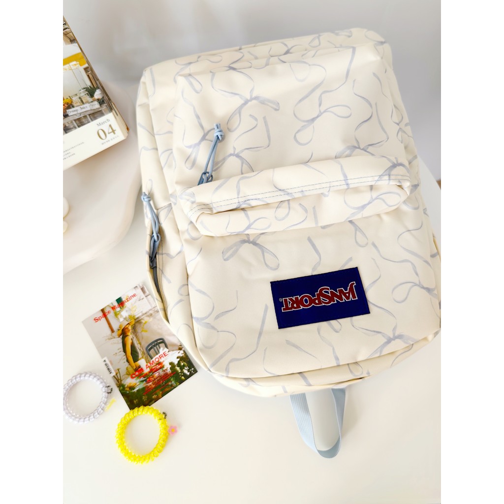 American JanSport พิมพ์ 4que นักเรียนกระเป๋าเป้สะพายหลังความจุขนาดใหญ่ผู้ชายผู้หญิงกระเป๋านักเรียนกร