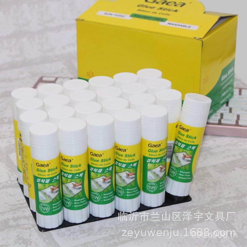 Solid 10g20g36g สํานักงานสีขาวอุปกรณ์กาวแท่งกาวการเรียนรู้ขายส่งความหนืดสูงขวดสีเขียวการศึกษาทางวัฒน