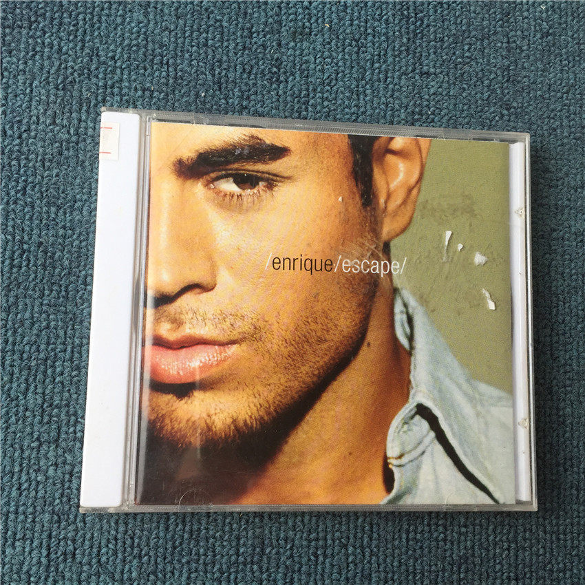 Enrique Escape + Bonus Tracks (ไม่มีการปิดผนึก) mang5 CD และหน้ากระดาษก็ดี