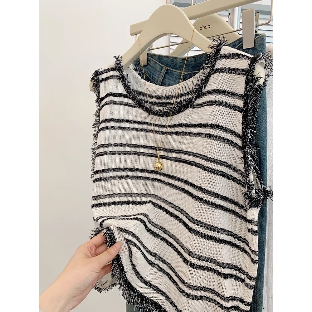 สิบสามเส้นฤดูร้อนสไตล์ใหม่เกาหลีรุ่นแฟชั่นทุกการแข่งขันรอบคอลายเย็บพู่หลวมเสื้อกั๊กแขนกุดหญิงฉัน เจี