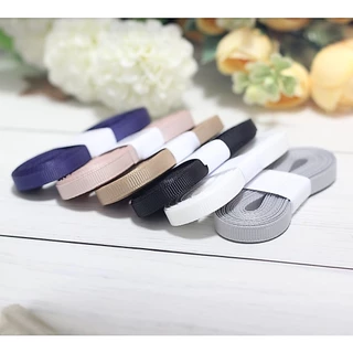 ริบบิ้นผ้ากรอสเกรน ขนาดหน้ากว้าง 0.6 cm ยาวม้วนละ 5 หลา มีให้เลือก 64 สี