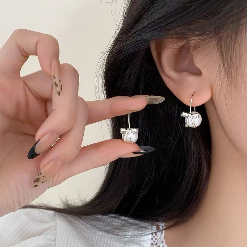ส925เงินสเตอร์ลิงโบว์ต่างหูมุกแฟชั่นที่เรียบง่ายสุภาพสตรีของขวัญสวมใส่ทุกวัน