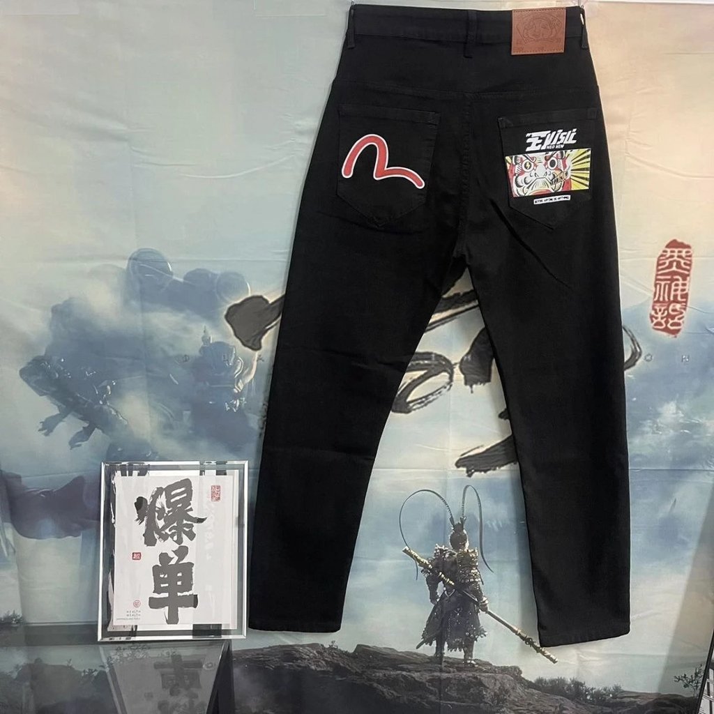 ((อย่ารับตัก) กวางโจวเทพเจ้าแห่งโชคลาภ EVISU สไตล์ใหม่ American Slim-fit Street Wear พิมพ์กางเกงยีนส