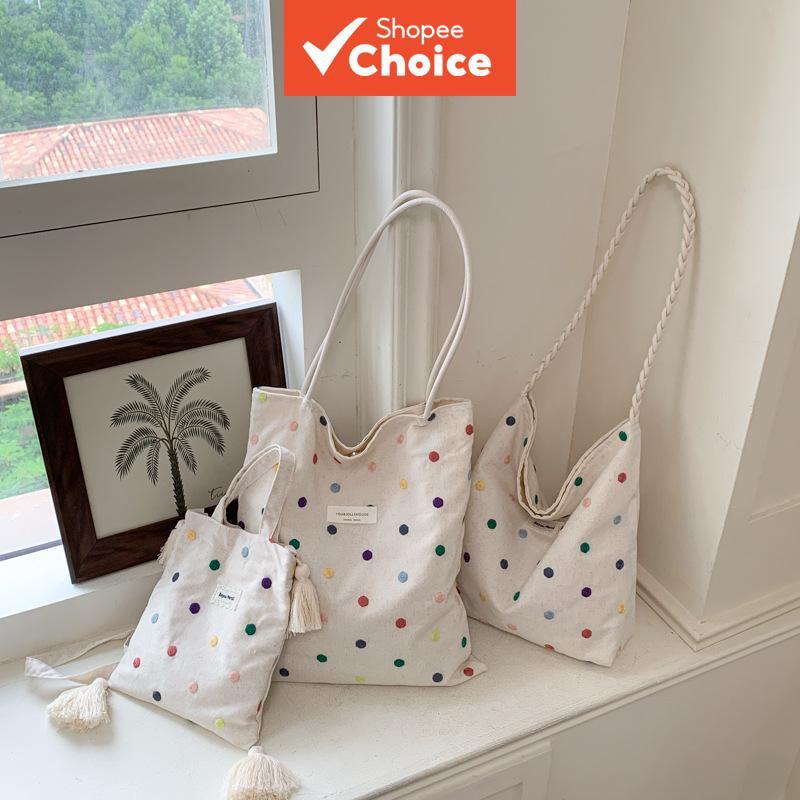 สินค้าใหม่ฤดูร้อน: กระเป๋าสะพายไหล่และสะพายข้างผู้หญิงทรงอาร์ท ลายจุดหลากสีปักลาย