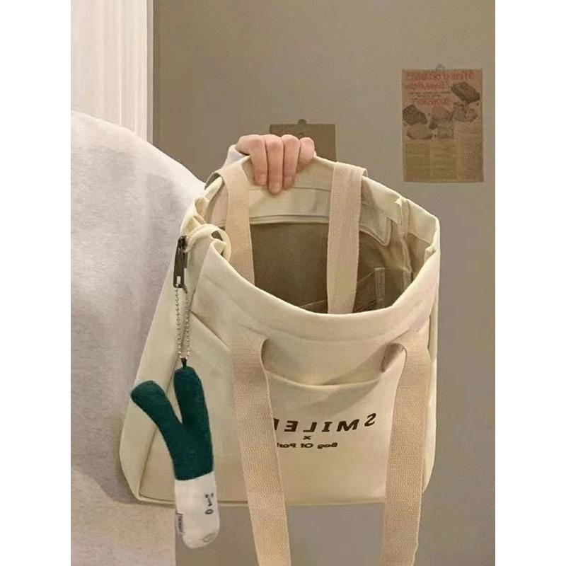 Puffie พร้อมส่ง กระเป๋าโท้ทผ้าแคนวาสผู้หญิง ใบใหญ่ จุของเยอะ สะพายไหล่ ไปเรียน ทำงาน