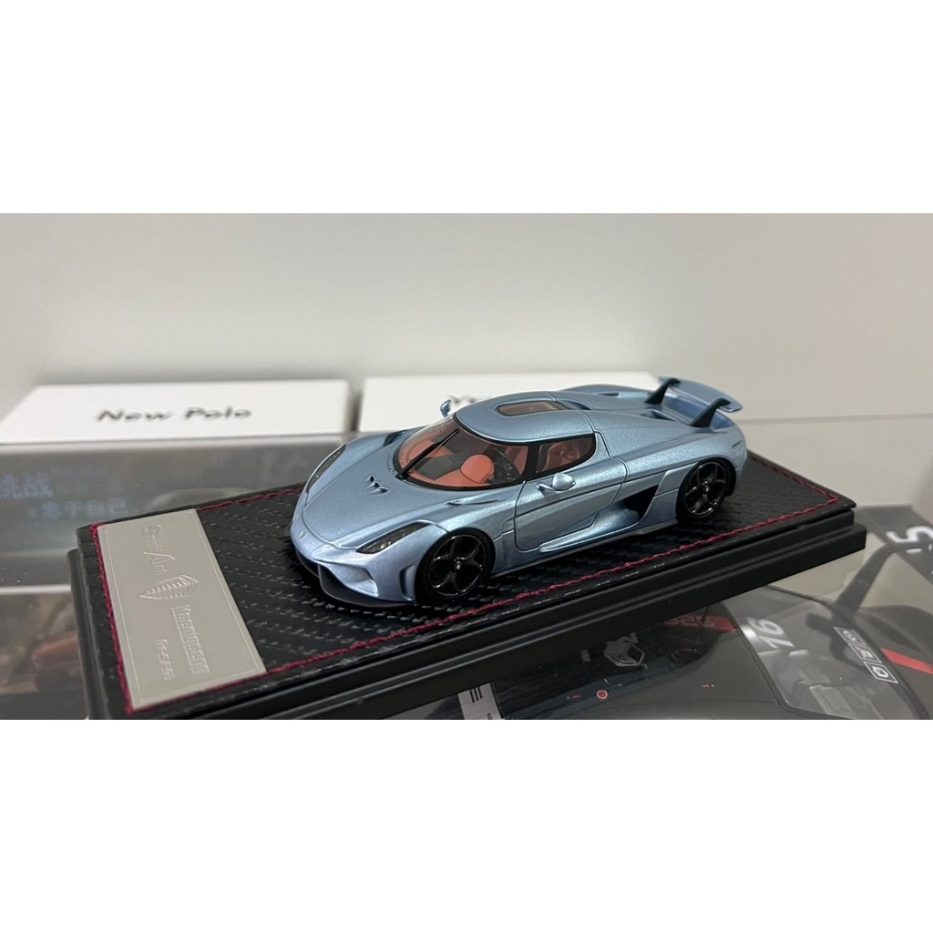 [คลังสินค้าพร้อมชุดเดียว] Koenigsegg Regera Koenigsegg Regera Koenigseggg Regera 1: 43 Scale Ice Blu