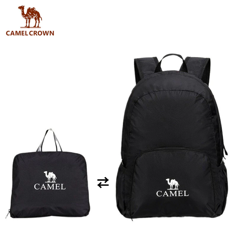 CAMEL CROWN กระเป๋าเป้สะพายหลังกลางแจ้งของผู้หญิง พับได้กันน้ําน้ําหนักเบาและพกพากระเป๋าเป้สะพายหลังขนาดเล็กสําหรับการเดินป่าท่องเที่ยวและการผจญภัยกลางแจ