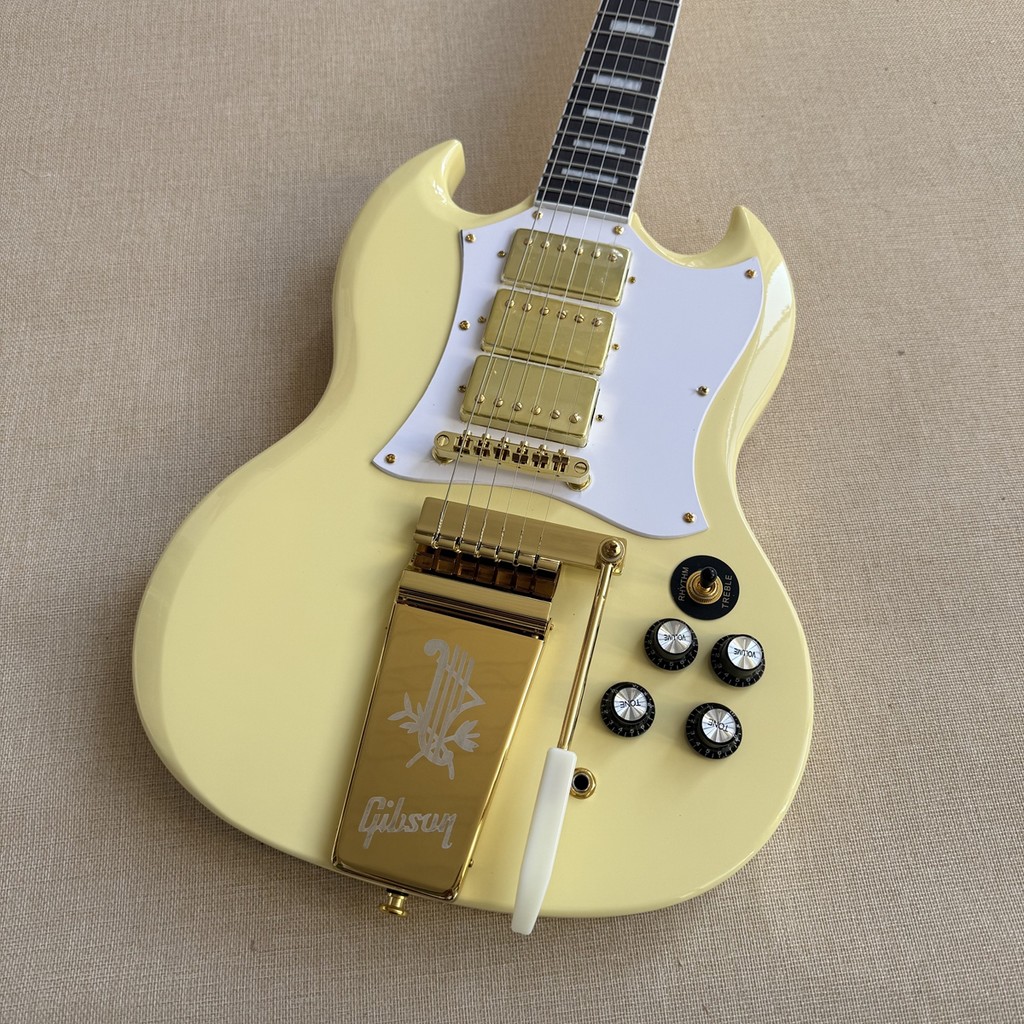 Gibson SG ครีมสีเหลืองรุ่นยาว Maestro Vibrola Tremolo