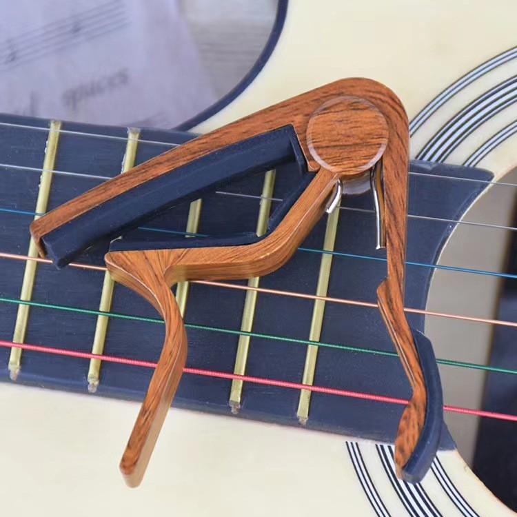 อี. Acoustic Acoustic Guitar capo Ukulele capo Guitar Clip อุปกรณ์กีตาร์ capo DJPI