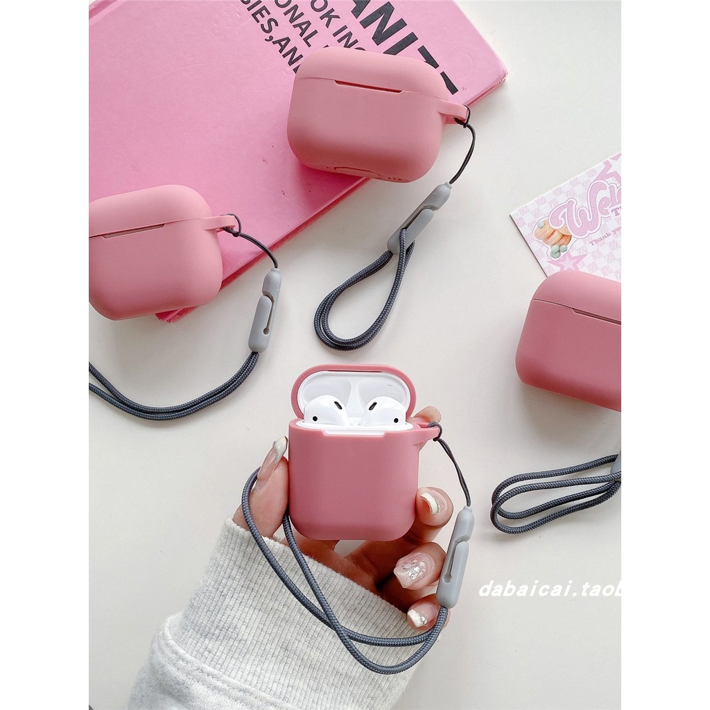 Ins Simple สีทึบพีชสีชมพูสายคล้องมือเหมาะสําหรับ airpods4 เคสหูฟัง pro รุ่นที่สอง airpodspro2 เคสป้อ