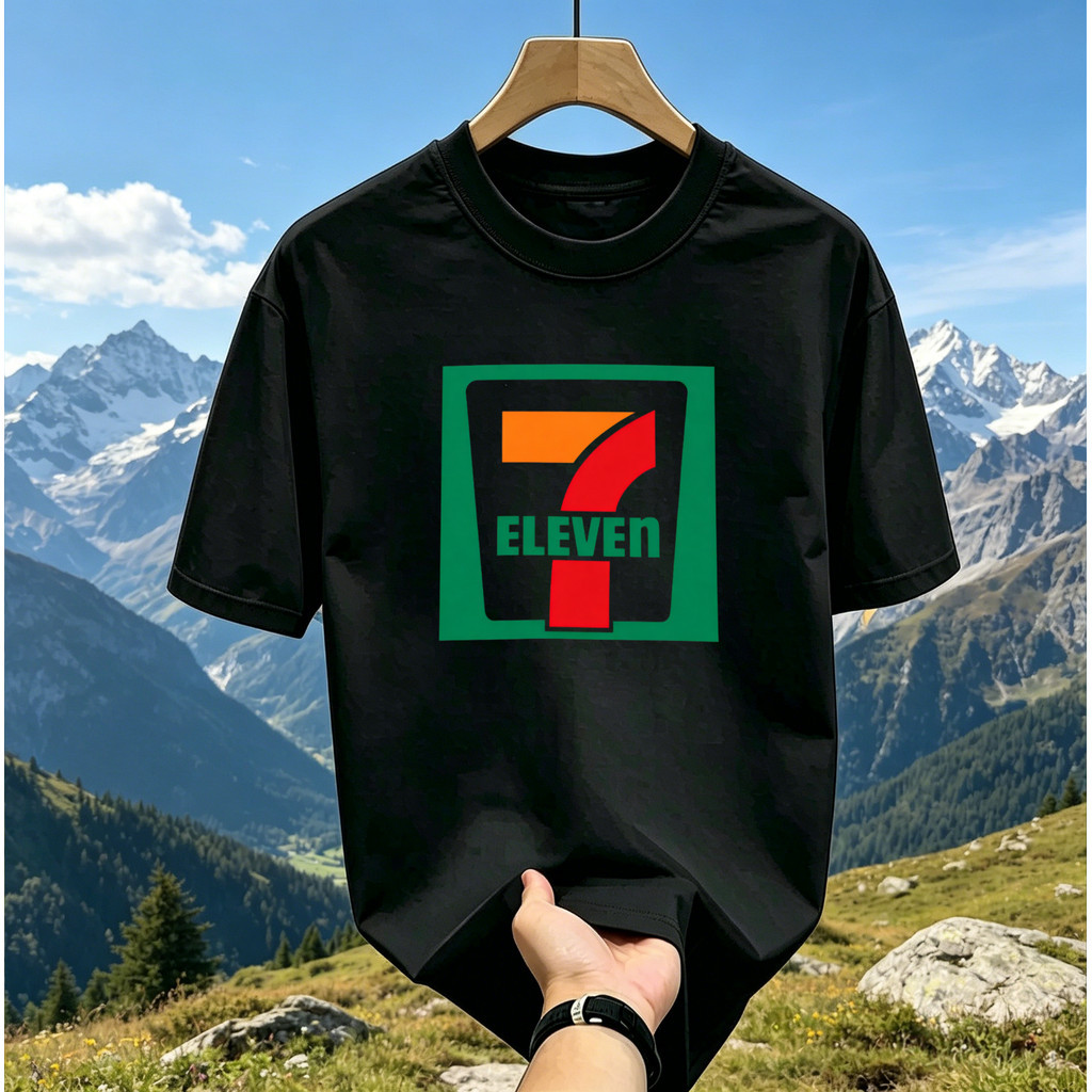 เสื้อแขนสั้นพิมพ์ลายป้ายร้านสะดวกซื้อ 7-ELEVEN สไตล์เรโทรอเมริกัน เสื้อคู่รักคอกลมแขนสั้น T-Shirt
