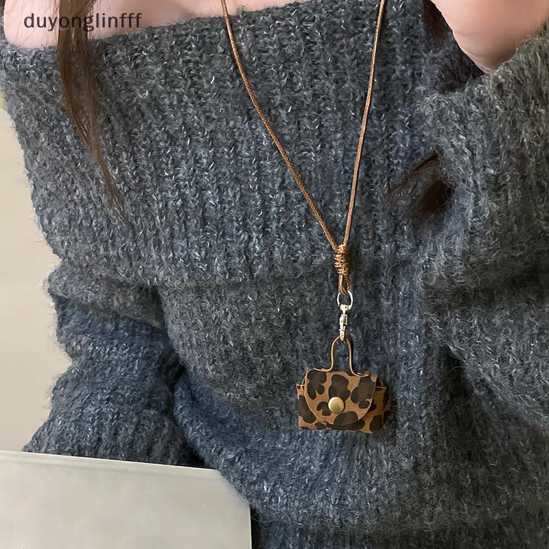 (ดูยงลินfff) กระเป๋าใส่เหรียญลายเสือดาวสร้อยคอหูฟังปกแขวนจี้ผู้หญิงเชือกแขวนเสื้อกันหนาวโซ่ใหม่