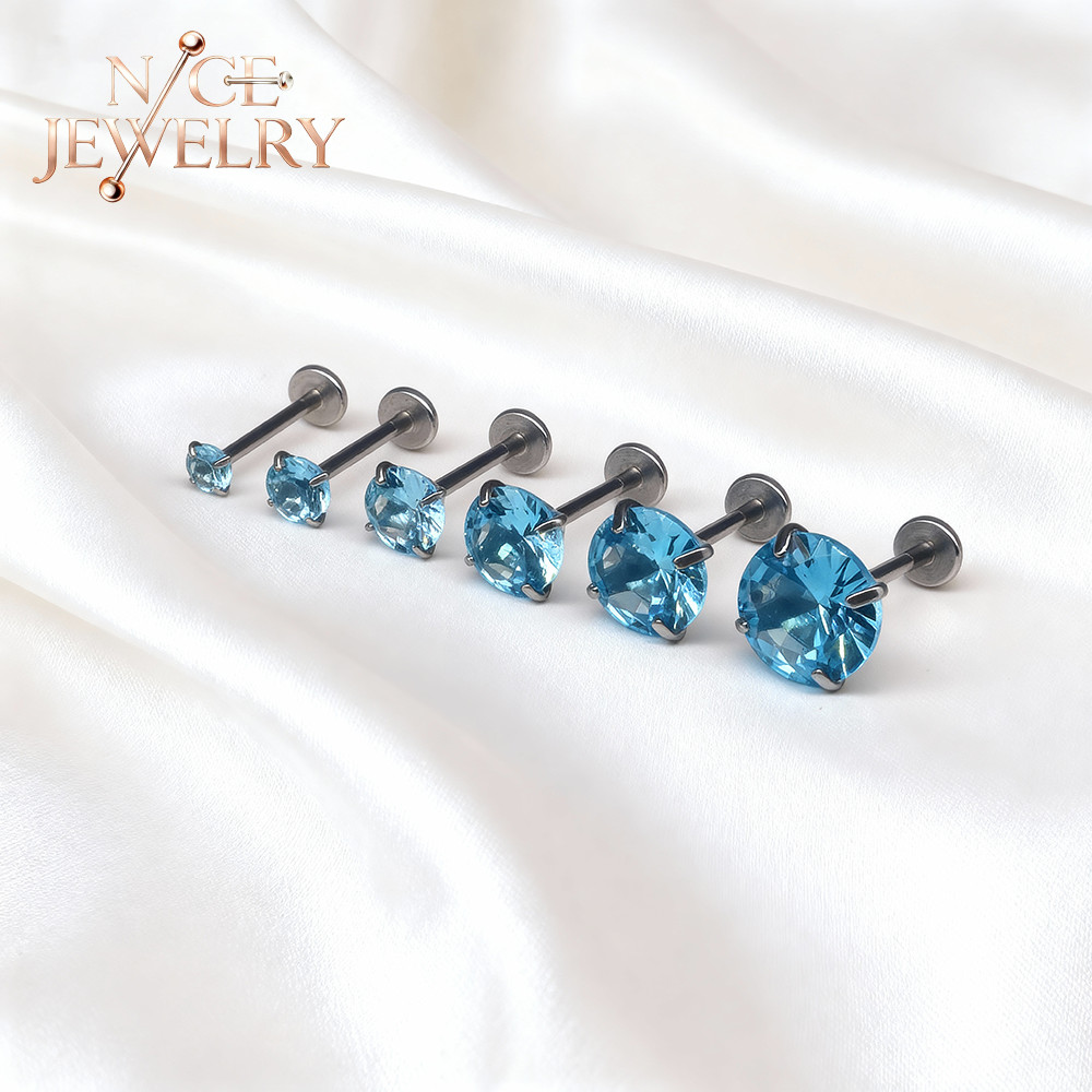 เครื่องประดับสแตนเลสสตีลสำหรับเจาะหูแบบ Tragus Stud พร้อมคริสตอลสีฟ้า ขนาด 16G และ 18G เหมาะสำหรับการสวมใส่ในตำแหน่งต่างๆ