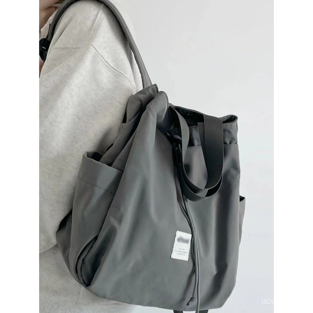 2025 กระเป๋าสไตล์ใหม่กระเป๋าเป้สะพายหลังกันน้ํากระเป๋าเป้สะพายหลังความจุขนาดใหญ่กระเป๋าเป้สะพายหลังล