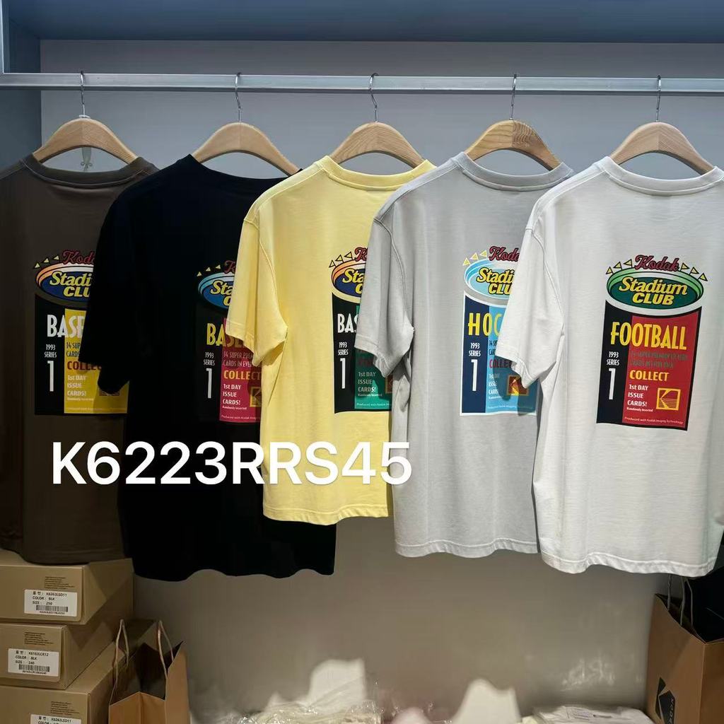 KODAK Kodak เสื้อยืดแขนสั้นพิมพ์ลายตัวอักษรกราฟฟิตีด้านหลังอเมริกันเสื้อยืดแฟชั่นลําลอง