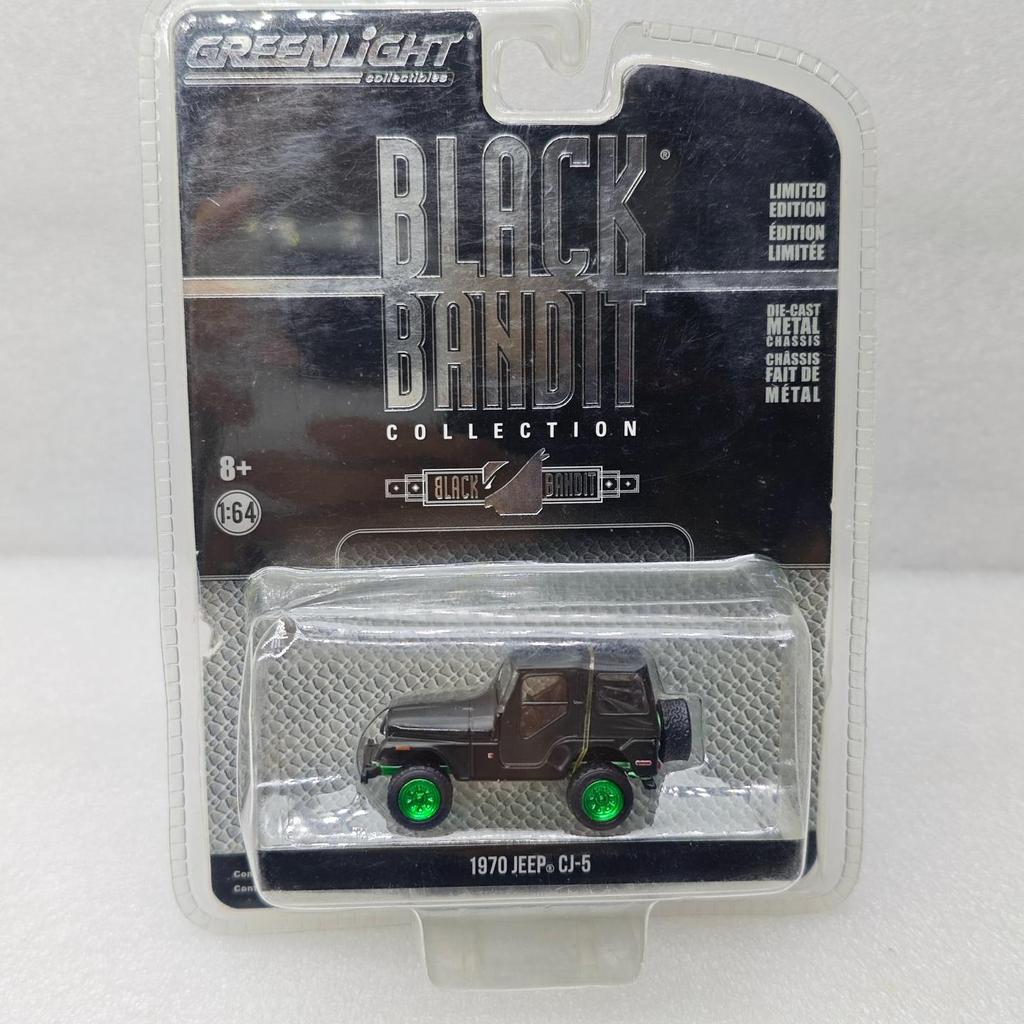 แสงสีเขียว 1: 64 Black Bandit Series 19-1970 Jeep CJ-5 รุ่นสีเขียว As Shot มี Been Opened