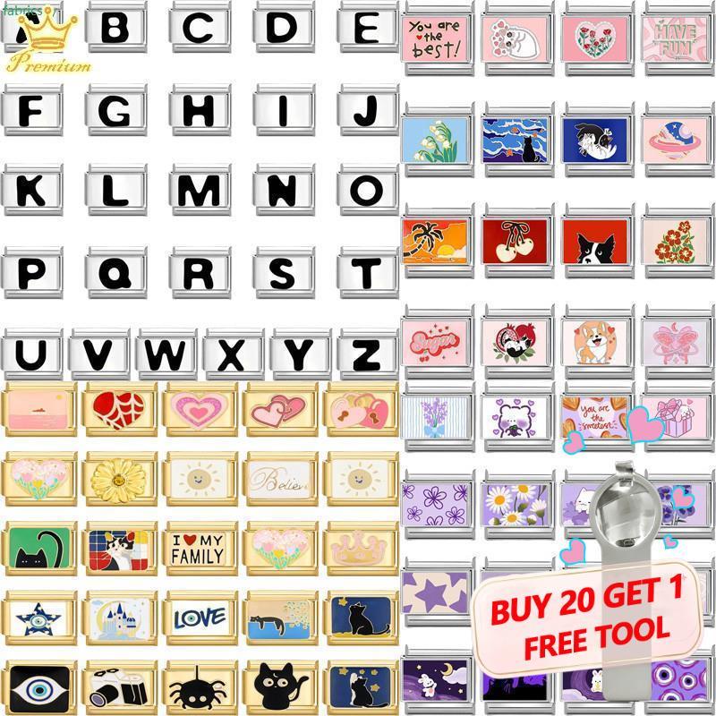 สร้อยข้อมือสแตนเลสสตีลMadeในอิตาลี มาพร้อมลิงค์charm สำหรับDIY สีชมพู ขนาด9มม. 26ตัวอักษร