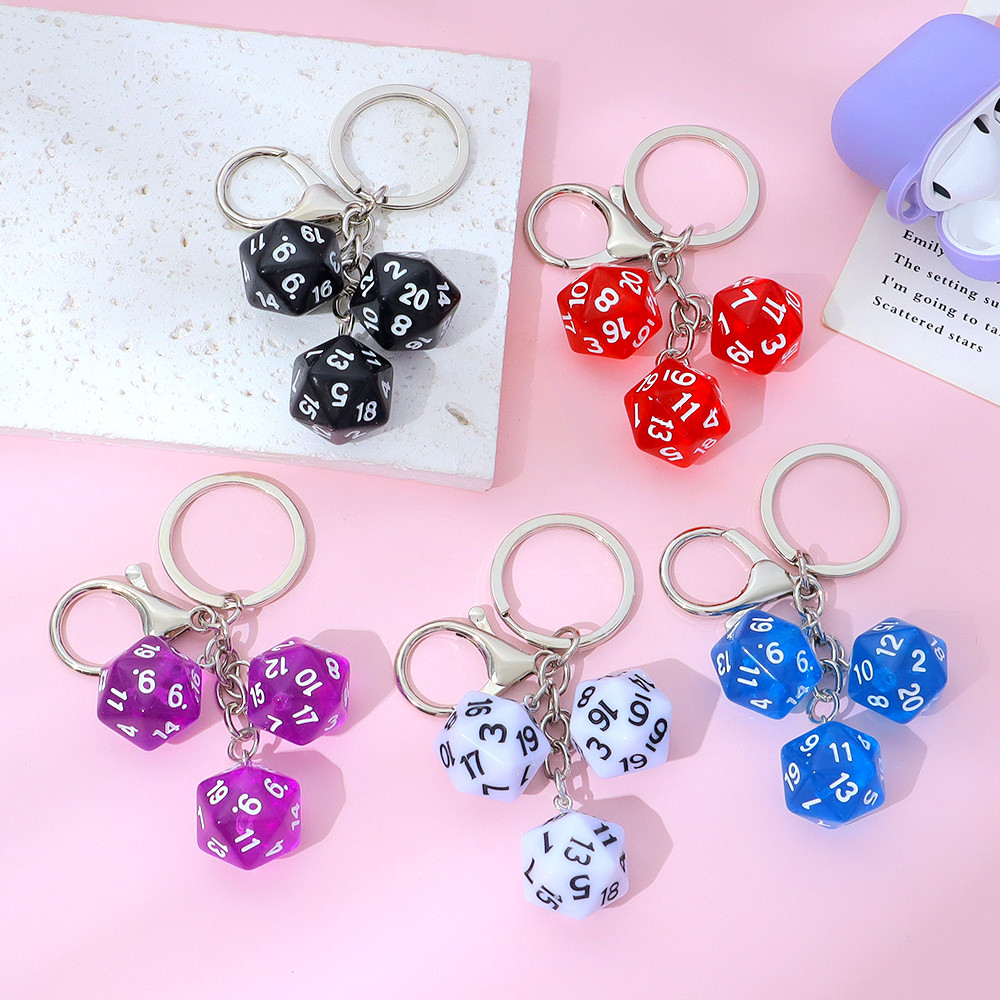 อินเทรนด์เรขาคณิต Polyhedral Die Key Chains คลาสสิกที่มีสีสัน Die Key แหวนสําหรับชายกระเป๋าเป้สะพายหลังเครื่องประดับ
