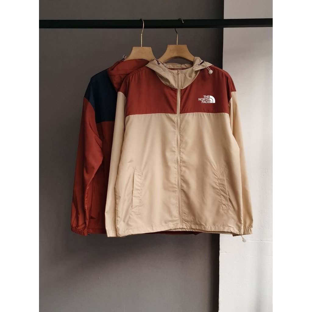 The North Face เสื้อแจ็คเก็ต windshell/TNF เสื้อคลุมกลางแจ้งป้องกันรังสียูวี 宽松 เสื้อกันลมแบบแพ็คที่