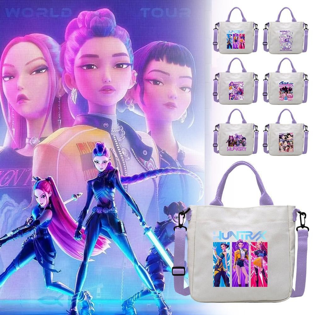 Kpop Demon Hunters กระเป๋าพิมพ์ผ้าใบกระเป๋านักเรียน Crossbody กระเป๋าถือสายคล้องไหล่ที่ถอดออกได้ K6o