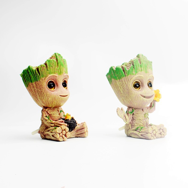 ขายร้อน Aquarium อุปกรณ์ภูมิทัศน์เรซิ่นนิวเมติกตกแต่งตู้ปลา Groot Tree Man Galaxy Guard ดอกไม้หม้อ T