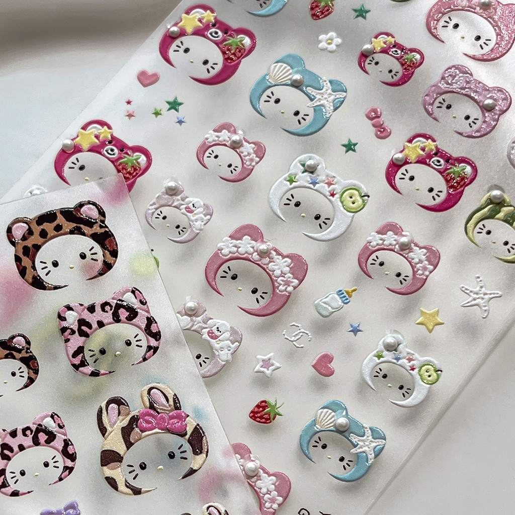 ใหม่น่ารักเสือดาวการ์ตูนชุดหูฟังสติกเกอร์เล็บ เคที แมวสวมมุกฤดูใบไม้ร่วง/ฤดูหนาวการ์ตูนแมวสติกเกอร์มุกบรรเทากาวตกแต่งเล็บขายส่ง