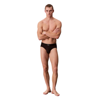 CALVIN KLEIN กางเกงในผู้ชาย Graphic Monogram Microfiber ทรง Hip Brief รุ่น NB4493 UB1 - สีดำ