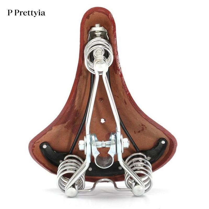 P Prettyia สไตล์วินเทจหนังจักรยานอานกว้าง Unisex เบาะ Shock Absorption Breathable สําหรับอุปกรณ์จักรยาน — صورة 2