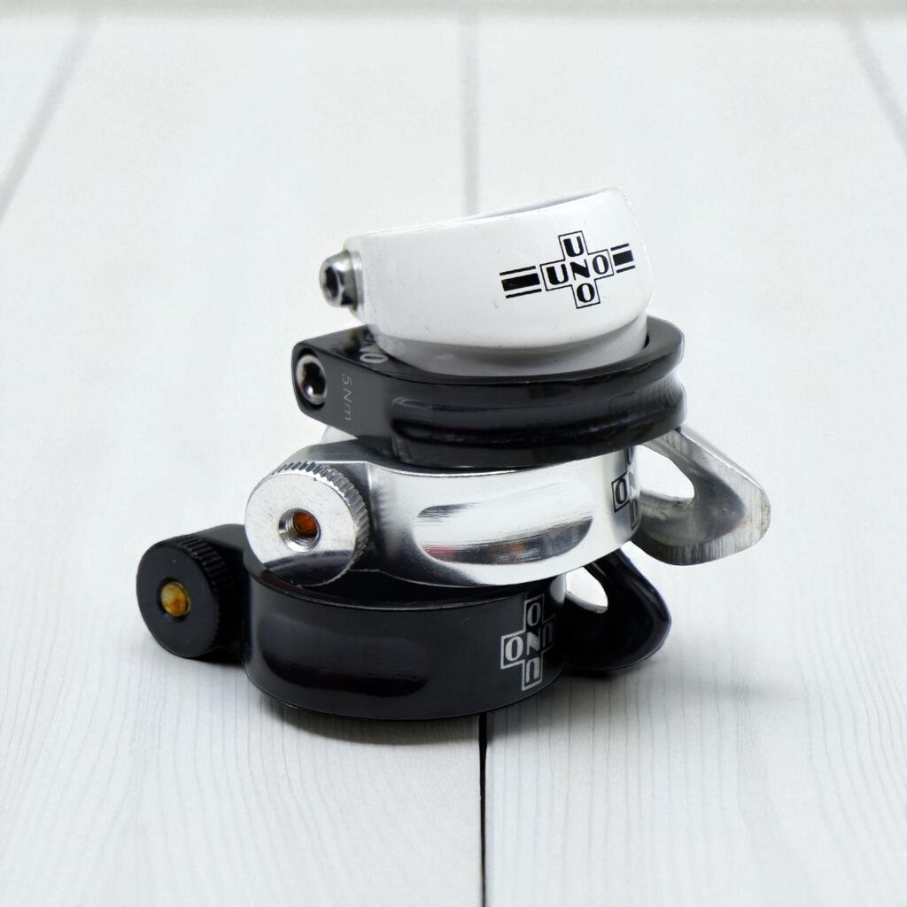 รัดหลักอานอลูมิเนียม UNO แบบน็อตยึด ขนาด 31.8 34.9