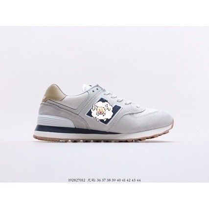 New Balance 574 รองเท้าผ้าใบสำหรับทั้งผู้ชายและผู้หญิง