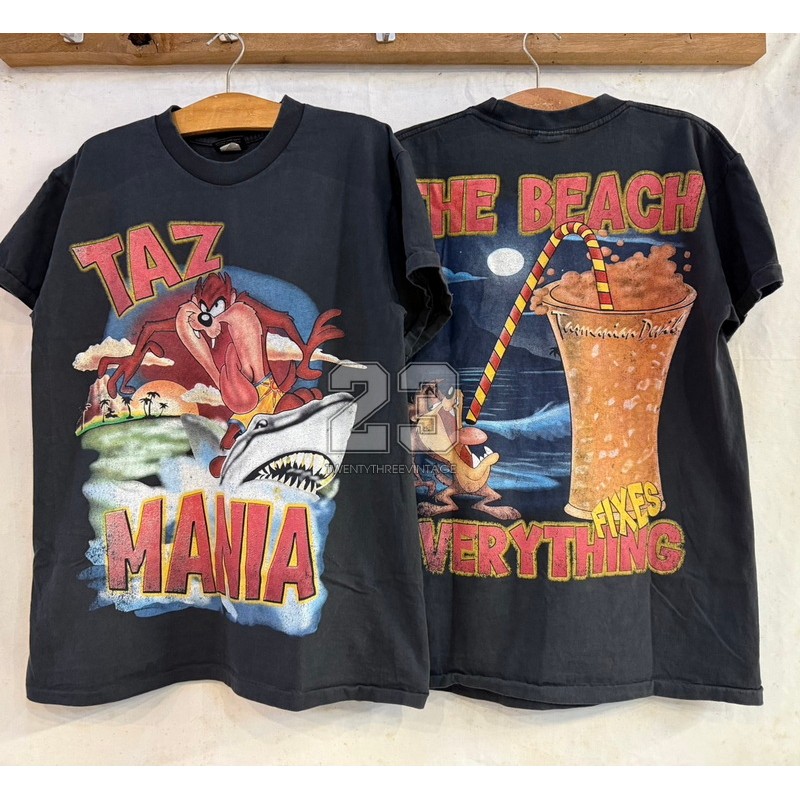 [ 23 ] ลูนี่ตูนส์ TAZ MANIA  The BEACH EVERYTHING FIXES Bio Washed เสื้อวินเทจ เสื้อการ์ตูน  vintage