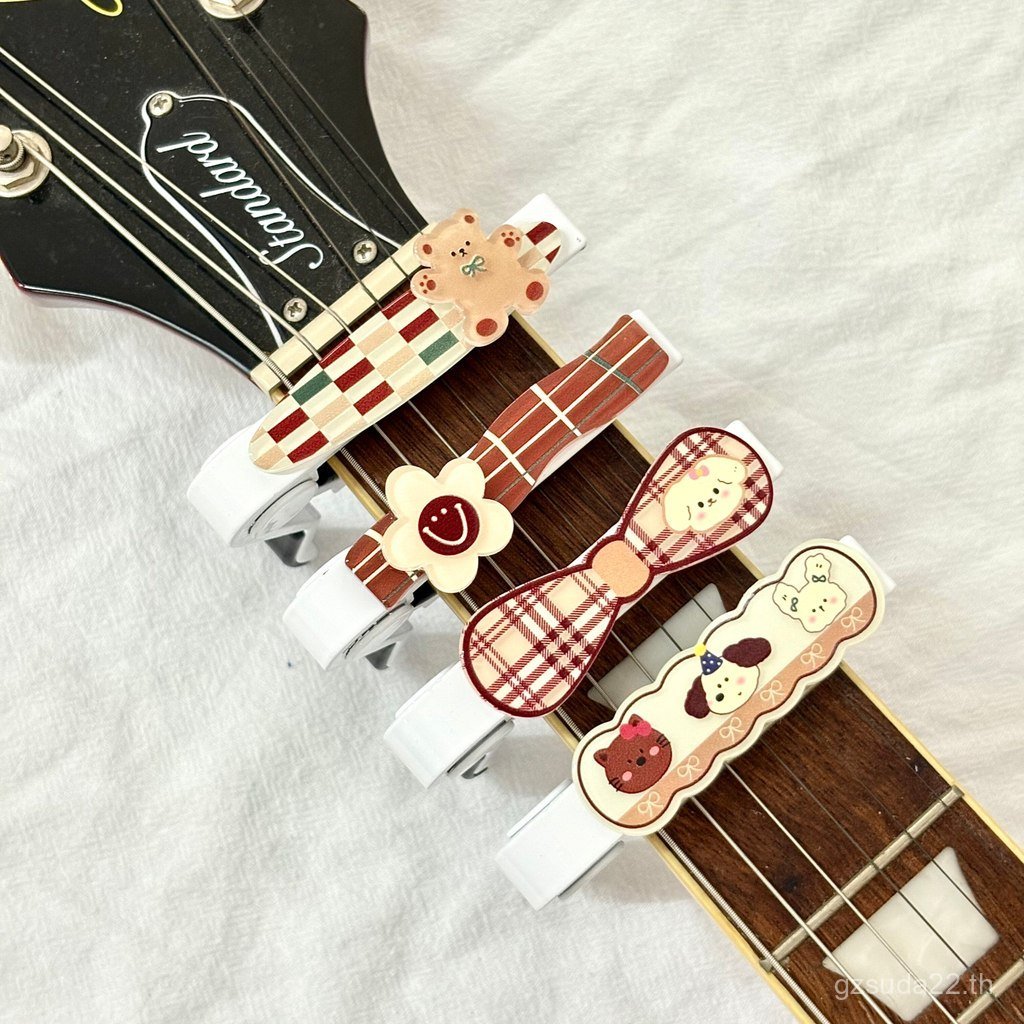 กีต้าร์โปร่งดอกไม้น้อยน่ารัก Capo กีต้าร์โปร่งไฟฟ้า Ukulele Capo Tuner จูนเนอร์ ORUQ