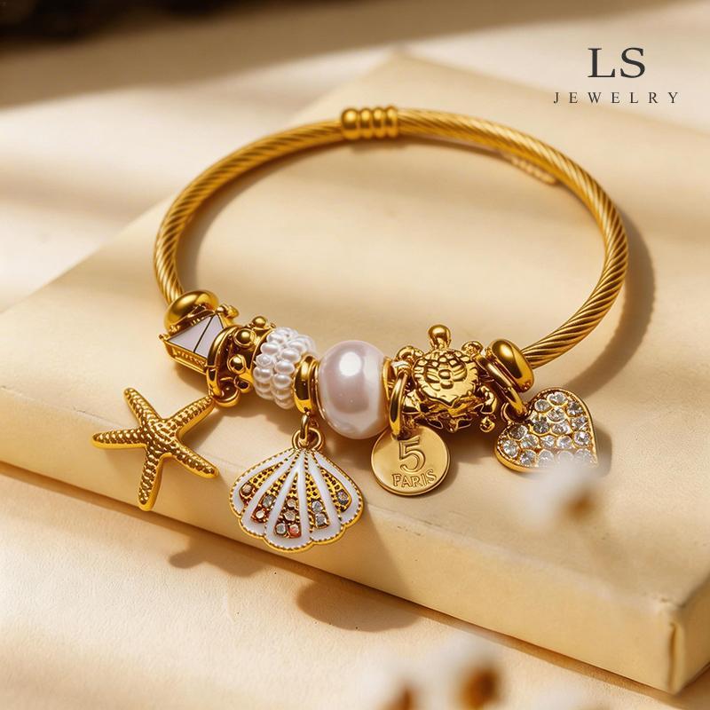 LS Jewelry สร้อยข้อมือแหวนกวาดสีทอง สายเคเบิลดีไซน์ธีมทะเล ชาร์มดาวทะเล หอย มุก และหัวใจเพชร ไม่แพ้ผิว เครื่อง