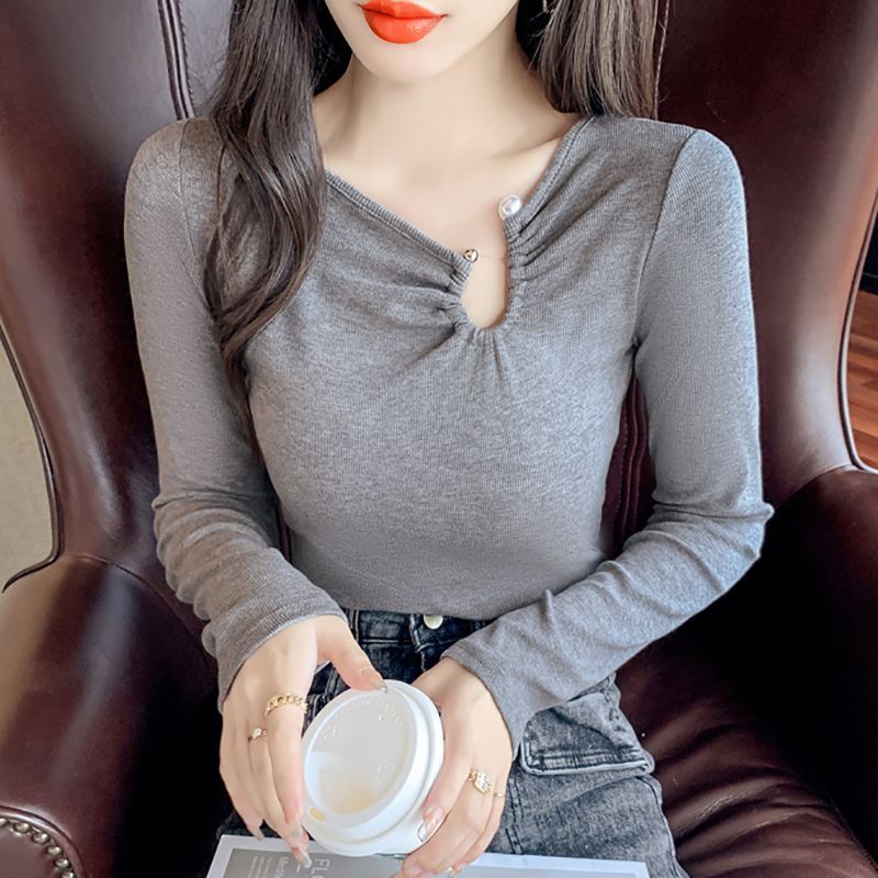 เสื้อผ้าฤดูใบไม้ร่วง 2025 สไตล์ใหม่ Slim-fit การออกแบบเสื้อขนาดเล็กที่สวยงามรู้สึก Niche เสื้อยืดแขนยาวผู้หญิงสัมผัส Clavicle Chic Top20251021