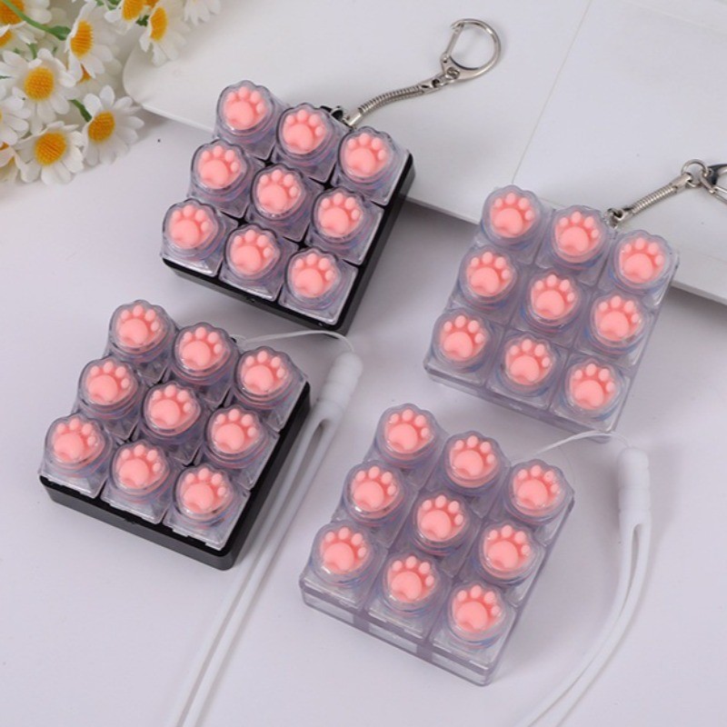 Cat Paw LED คีย์บอร์ด Fidget ของเล่นพวงกุญแจคีย์บอร์ด Fidget Key Chain ของเล่นบีบอัดปุ่มนิ้วมือ Clicker ความเครียดบรรเทาของขวัญ