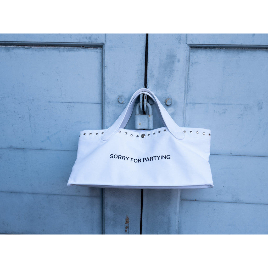 Piccoro - "SORRY FOR PARTYING" tote bag กระเป๋าตอกหมุดสกรีนคำ