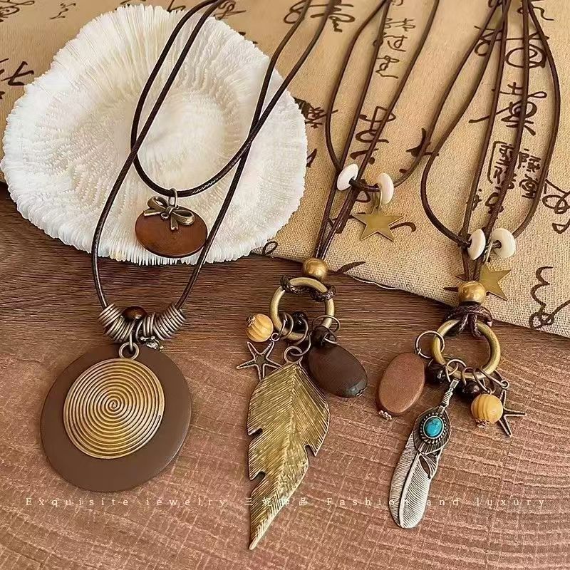 ใหม่จีน Retro ยาวโซ่เสื้อกันหนาว Zen Feather สร้อยคอผู้หญิง 2026 สไตล์ชาติพันธุ์ซ้อนอุปกรณ์เสริม APB