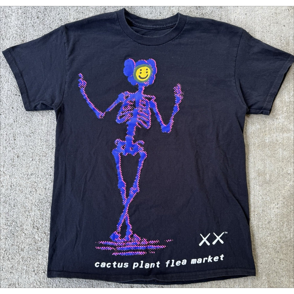 KAWS x Cactus Plant Flea Market เสื้อยืดเต้นรำ สไตล์ Skull Smile สีดำ