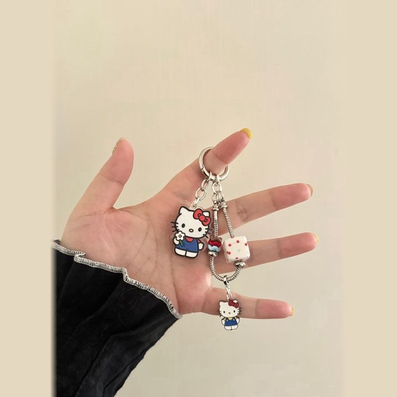 อินสไตล์โบว์สีแดง เคที แมวโซ่โทรศัพท์มือถือย้อนยุคสีฟ้าหลวมกระเป๋าเครื่องประดับพวงกุญแจเชือกป้องกันการสูญหาย