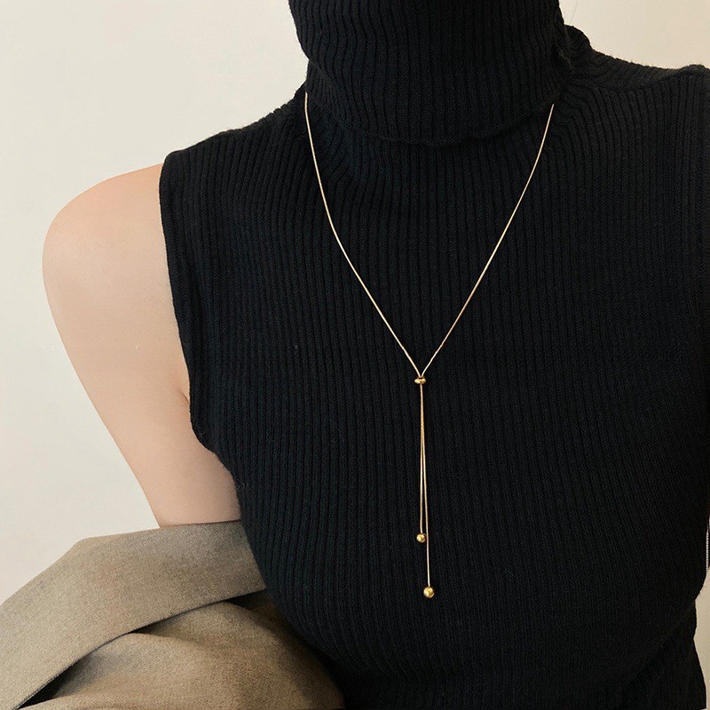 Pull-out เสื้อกันหนาวยาวสไตล์งูโซ่กระดูก 18k Gold Simple ไทเทเนียมเหล็กสร้อยคอไม่ซีดจางหญิงหรูหรา Ni