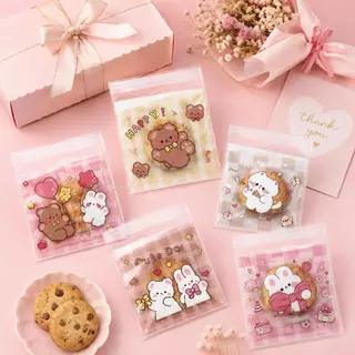 ถุงแพ็คขนม 14×14+3 ซม. 100 ใบ ถุงคุกกี้ใส ปากกาวในตัว ลายการ์ตูนน่ารัก ถุงเบเกอรี่ ใส่ขนม ของชำร่วย งาน DIY พร้อมส่ง COD