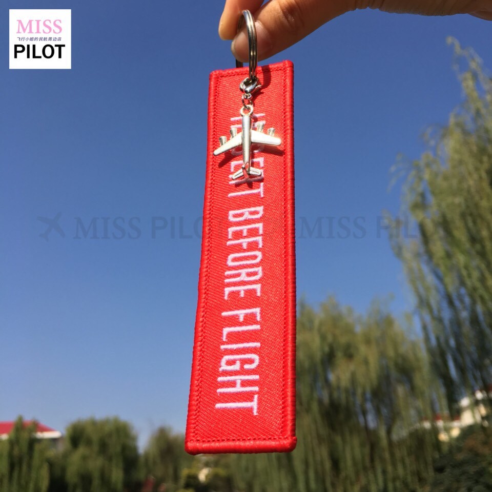 REMOVE BEFORE FLIGHT กําจัดการบินจี้แท็กกระเป๋าเดินทางหน่วยกระเป๋าเดินทาง Stewardess