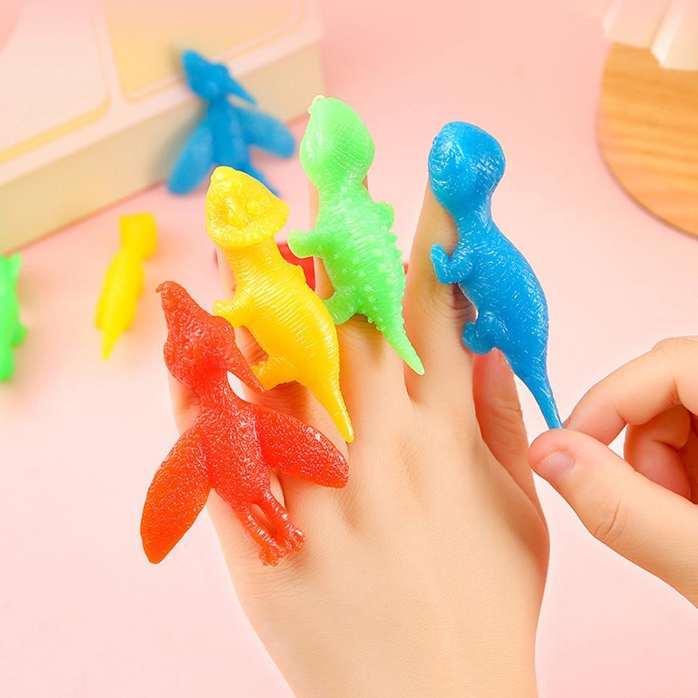 Creative Finger Catapult ไดโนเสาร์ของเล่นบีบอัด X2X4