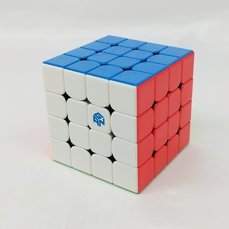 GAN460M Four-Order Rubiks Cube รุ่นแม่เหล็ก 4X4 60 มม.สีดําพื้นหลังสี Patch การแข่งขันปริศนาเรียบ