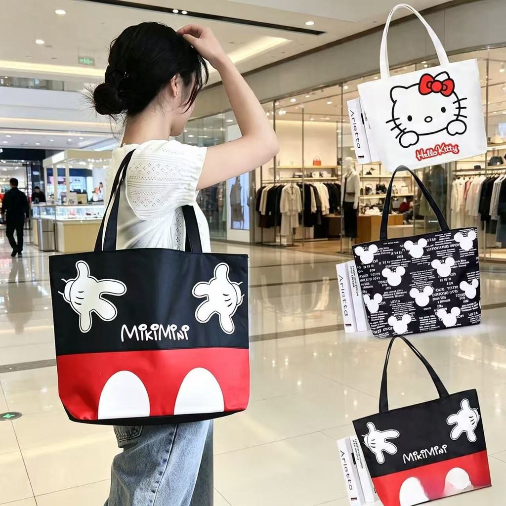 BM-shop:กระเป๋าสะพายไหล่ผ้าแคนวาส พิมพ์ลายการ์ตูน ความจุสูง ทรงทอตต์ น่ารัก ใส่ของได้เยอะ สะพายไปทำงาน bao6065