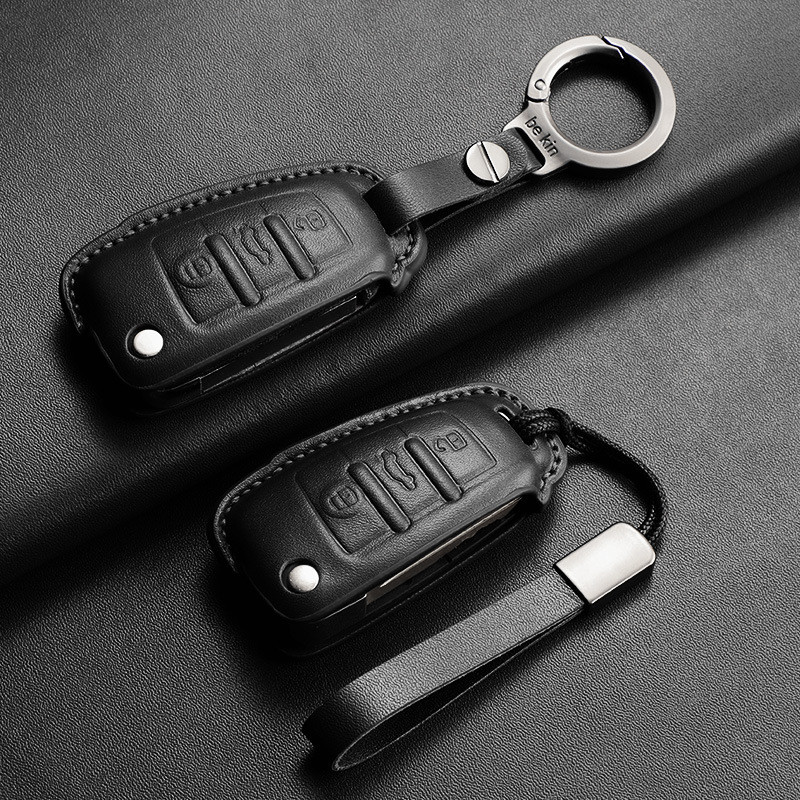 ขายร้อน-เหมาะสําหรับ Audi Q2L Q3 Q3 Sportback Q2L e-tron ของแท้หนังฝาครอบพับ Key Unisex